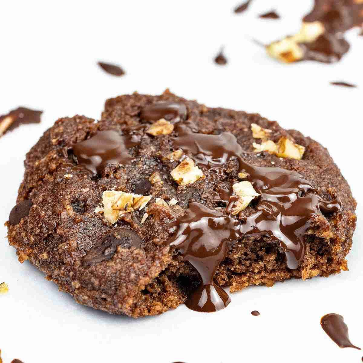 A Healthy Protein Chocolate Chip Cookie with walnuts that is gluten free, keto, grainfree, sweetened with monk fruit without erythritol.